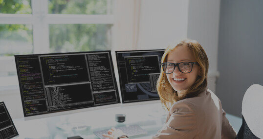 young female developer works on code it jobs timetoact group